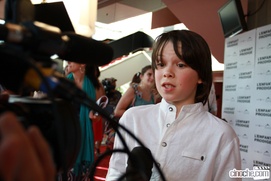 Sur le tapis rouge de L'enfant prodige
